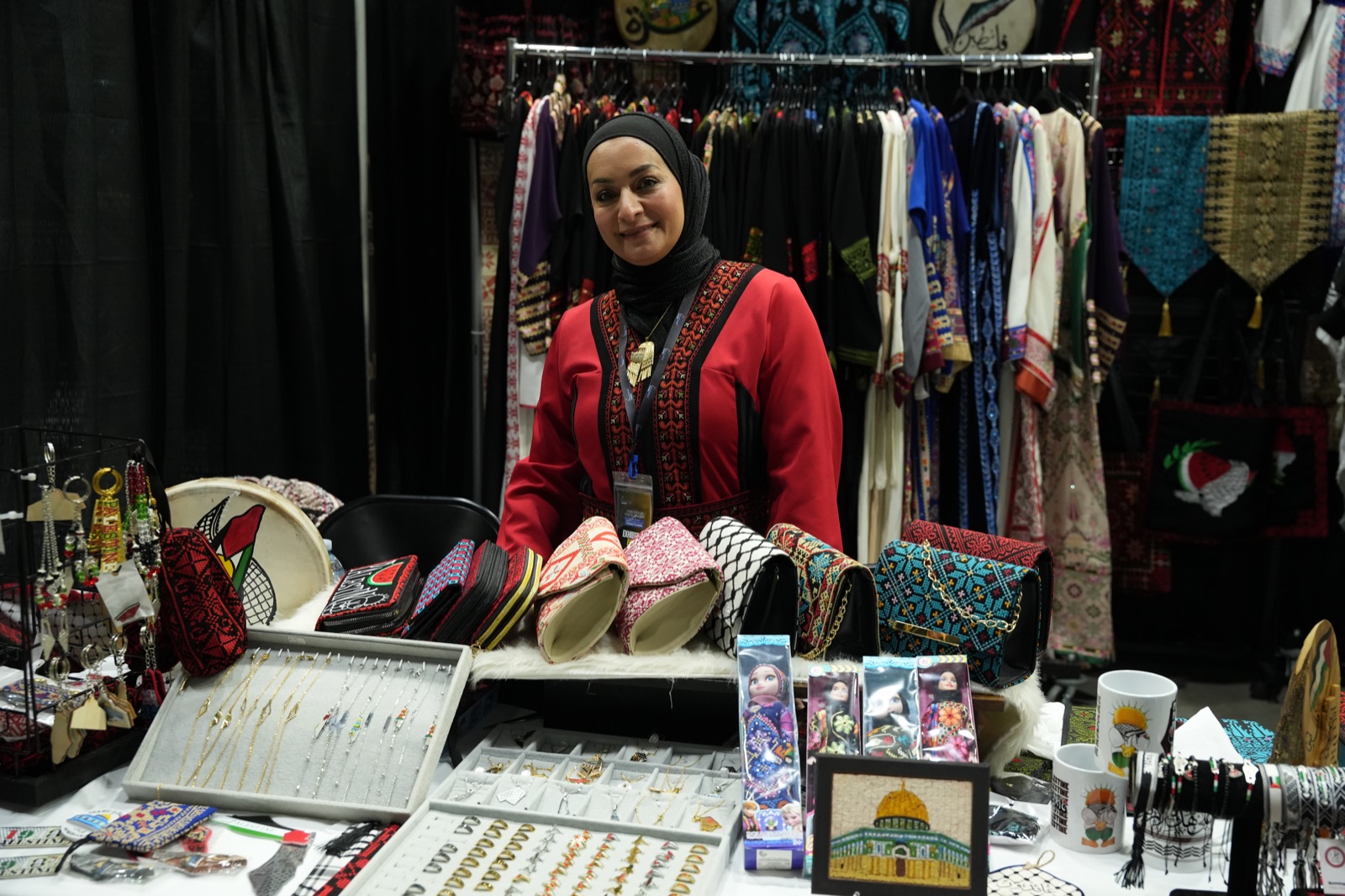 Smiling vendor at her accessories stall