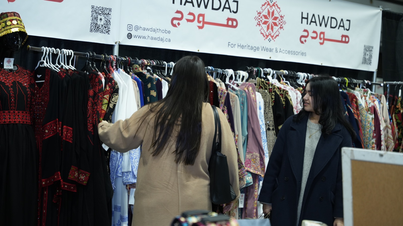 Shoppers browsing fashion racks